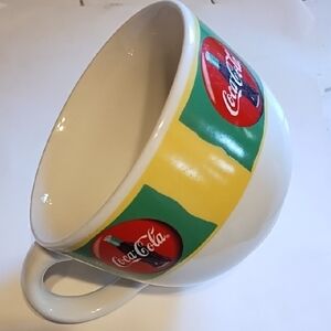 Coca-Cola Cup with Red and Yellow Design